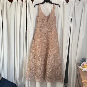 Miss Rosier lace floral midi dress. Sells at Macy’s for $185.